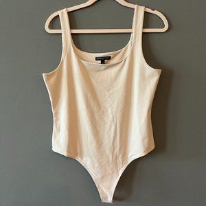 Classic and Versatile Banana Republic Nude Bodysuit (Size Large)